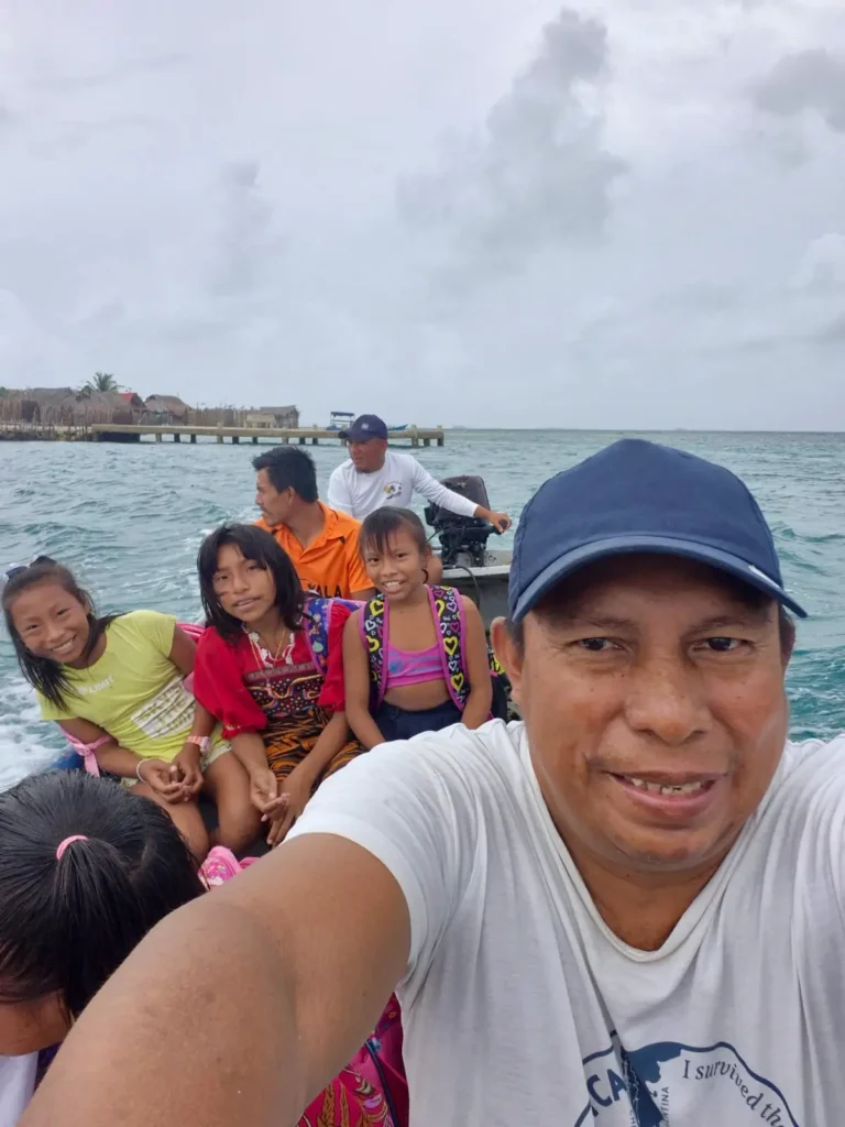 The project proposes building three additional traditional Guna-style classrooms and acquiring a 26ft fiberglass boat with a Yamaha 40 HP engine to safely transport students.